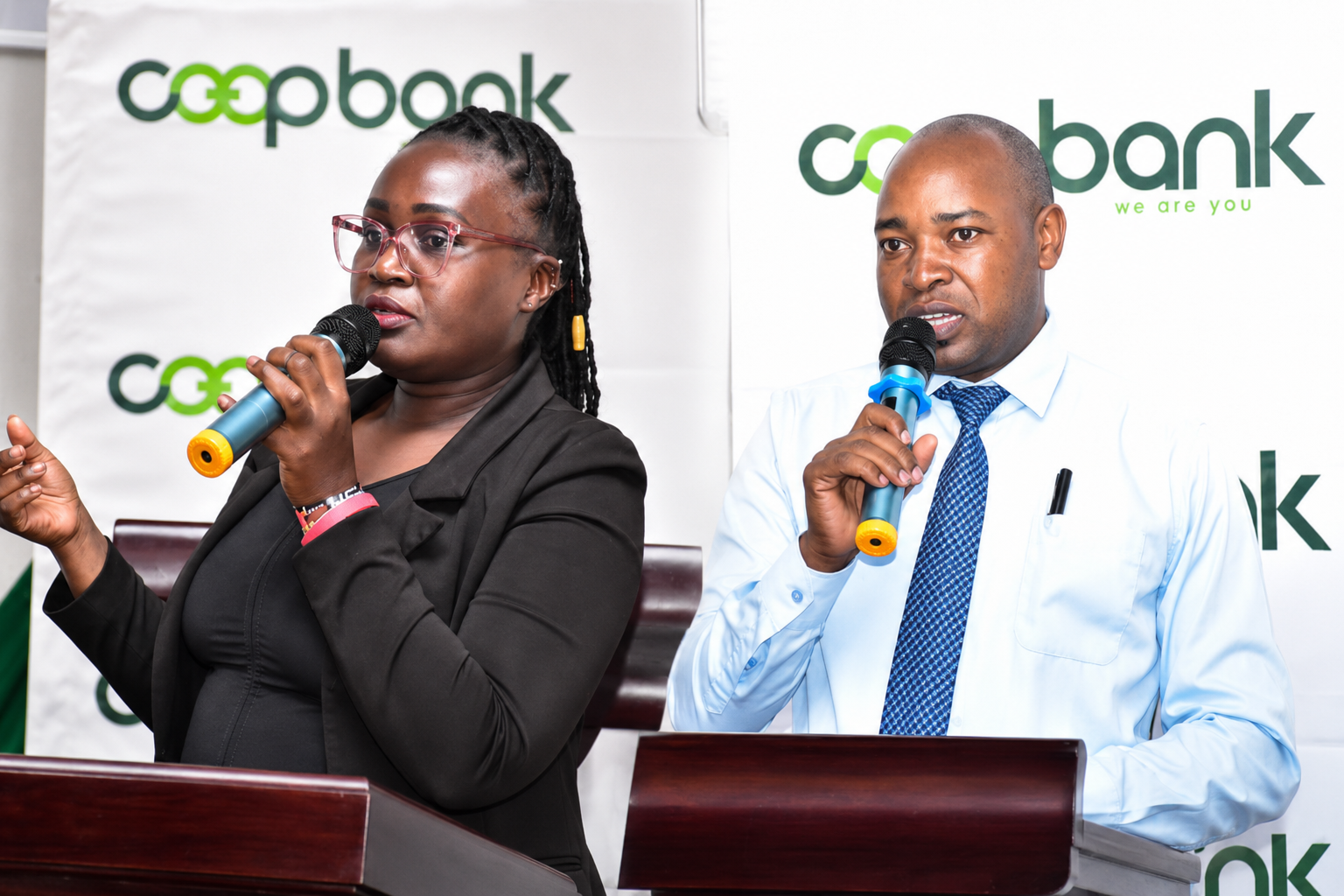 Young farmers accessing agricultural credit and expert training through Co-op Bank's youth agribusiness initiative.
